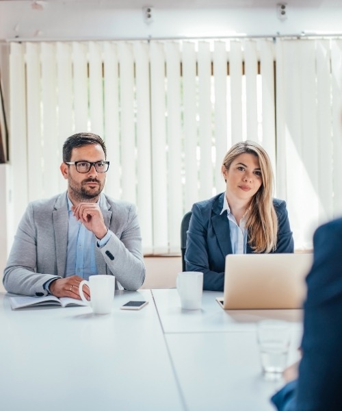 Recruiter reviewing candidate profiles during hiring process